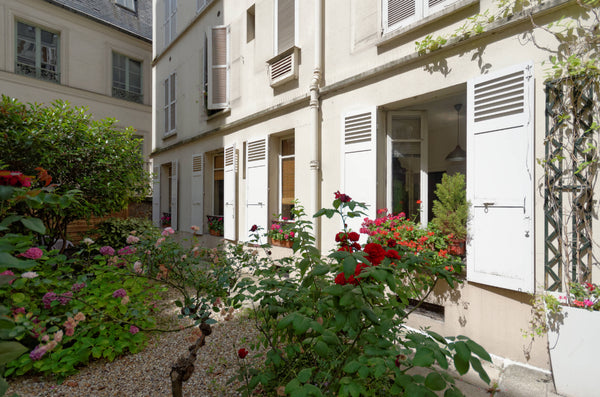 This is a peaceful and charming one bedroom flat on a ground floor leading to a  Paris, France Peaceful and atmospheric flat Entire rental unit vacation rental 7081601