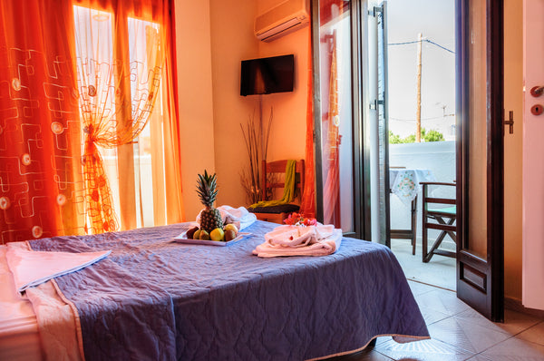 Our small but cozy double room 15sq.m «Christina» are in a quiet and  beautiful  Adamantas, Greece Bright double room in 