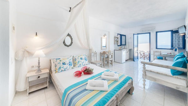 Agnadi Villas Santorini is a brilliantly whitewashed building surrounded by beau  Agnadi Superior Sea View Room Private room in bed and breakfast vacation rental 47524050