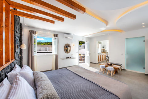 A well designed SUPERIOR ROOM decorated with the authentic Cycladic architecture  Abasa Suites "Superior Suite with Hot Tub" Room in hotel vacation rental 44159754