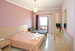 Family-run Akrogiali features a beachfront restaurant with a strong foundation o Chania, Greece Beachfront Cretan Sea-Quadruple Private room in bed and breakfast vacation rental 2855891