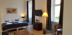 Dette familieejede hotel ligger 5 minutters kørsel fra Københavns Hovedbanegård,  Rum på Amagerhotel Private room in rental unit vacation rental 45096004