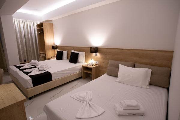 Marvel Deluxe Rooms is a brand-new accommodation in an ideal location for visito  Triple Room - Marvel Deluxe Rooms Heraklion Room in hotel vacation rental 42549422