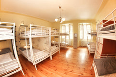 Cozy bright room is containing 6 bunk beds, this really feels like a sociable ro Prague, Czechia Hostel HOMEr - 12 bed mixed room Shared room in hostel vacation rental 29767095