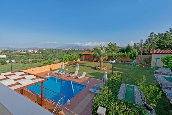The modern Villa Aretousa 1 is situated on a green hill, covered with olive grov  Villa for 7 with private pool and mini golf course Entire villa vacation rental 27971183