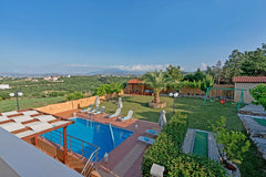 The modern Villa Aretousa 1 is situated on a green hill, covered with olive grov  Villa for 7 with private pool and mini golf course Entire villa vacation rental 27971183