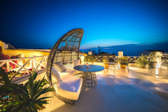 This charming cave House is in the heart of Oia & offers a nice view to the sea  Greece SantoriniParadise: SUNSET STUDIO view from terrace Cycladic home vacation rental 25649115