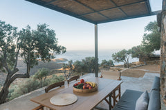 This 55 sq.m. eco-friendly house is located 18 mins by car from the port of Tino Athens, Greece Avdos' olive house - land tales Cycladic home vacation rental 44511397