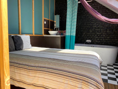 Il s'agit d'un loft situé dans les combles d'un bel immeuble de caractère datant  Loft au Châtelain Entire loft vacation rental 670025708951922000
