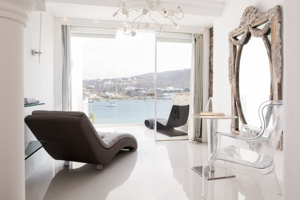 Masterfully built along a rocky slope, KIVOTOS dazzles with the spectacular arch  Kivotos Mykonos Junior Suite with Sea View Room in hotel vacation rental 43150115