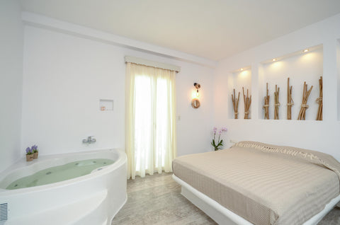 A very spacious suite with indoor spa bath specially designed for discerning gue  Suite with Indoor Spa Bath close to the beach Room in boutique hotel vacation rental 30281792