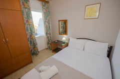 A double room with balcony, private kitchen and bathroom with shower. In the liv Chania, Greece Village Drapanias Entire rental unit vacation rental 14394272