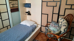 Pas loin de la mairie du 18ème ni du Sacré Coeur (à condition de monter des esca Paris, France Chambre agréable ajustée à un salon en plein 18ème Private room in rental unit vacation rental 6090638