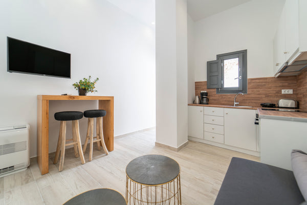 Beautiful and modern flat in the center of Fira, just 5 minutes walk from the fa  Nostos | Central Apartment with Terrace & Jacuzzi Entire rental unit vacation rental 27247048