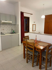 Furnished one-room apartment in a garden on the beach of Kamisiana next to Kolim  Livadia studios on the beach Room in aparthotel vacation rental 618052683119684239