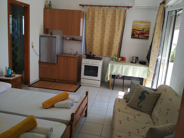Private room with two beds and balcony in first floor.<br />Sunny, peaceful and   SKY APARTMENTS ANISSARAS Private room in rental unit vacation rental 17143528