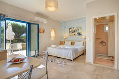 Studio for 1 or 2 is located in the East side of the hotel. This type has one ro  Pyrgos beach hotel, studio with garden view Room in aparthotel vacation rental 28848970