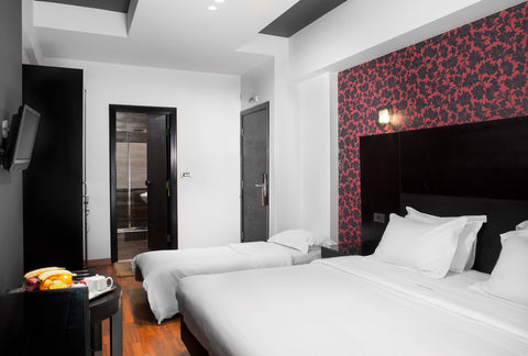 A spacious room with exceptional style, providing endless possibilities for frie GR Triple room Room in hotel vacation rental 53652268