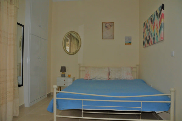 A quiet renovated apartment with its kitchen, which has all that will make you l Athens, Greece Sensitive Apartment Near Metro Dafni Entire rental unit vacation rental 42856529