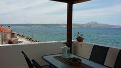 Seaside appartment at kalives village 15 kilometers east of chania city.Literall  kalives beach house Entire rental unit vacation rental 17888969