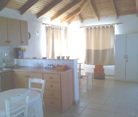 A bright new apartment of 55 m2. It is only 8 meters from the sea (only a 2 min  Crete Region, Greece comfortable quiet apartment close to the sea Entire home vacation rental 33072528