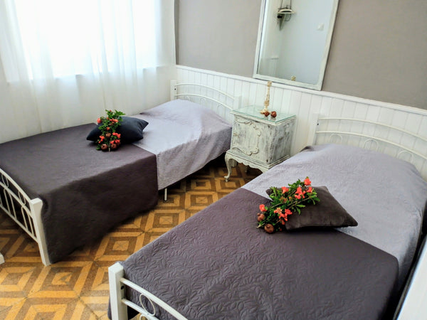 The space consists of two bedrooms, bathroom and kitchen and is located on the g  Hermoupolis Syros Maisonette Cycladic home vacation rental 37451476