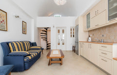 A quaint 60Sq m double-storey suite with fully-equipped kitchen. 1 bedroom with  Thera, Greece Ayoba Santorini - Traditional Suite Entire rental unit vacation rental 12436629