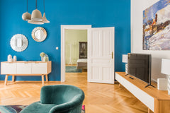 Sink into the teal velvet reading chair and plan the day's adventures in the lig Vienna, Austria Walk the Herringbone Floorboards at a Sunny, Spacious Haven Entire rental unit vacation rental 23095993