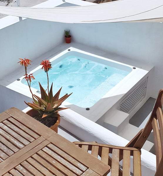 Set amidst the cave dwellings of the unspoiled traditional village of Vothonas L Greece Lagadi Queen House private hot tub Cycladic home vacation rental 35955630