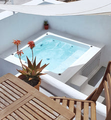 Set amidst the cave dwellings of the unspoiled traditional village of Vothonas L Greece Lagadi Queen House private hot tub Cycladic home vacation rental 35955630