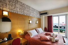 Opening to a balcony with views of Heraklion Port, this modernly decorated room   Life Hotel Double Sea View "By Estia" Entire rental unit vacation rental 580228234394928841