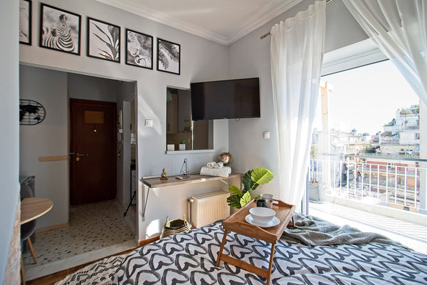 This cozy penthouse boasts a BIG verandah, with views of Athens.<br />The latest Marousi, Greece Athenian Sun-Kissed Penthouse with  huge Balcony! Entire condo vacation rental 40877848