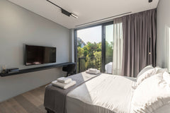 The suite has soft neutral palettes, a comfortable living room, a cozy bedroom a CY The Duke suite 301 (studio suite) Room in aparthotel vacation rental 38174122