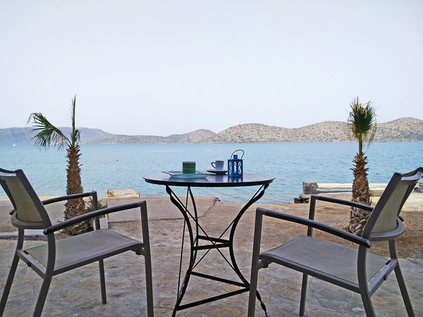A wonderful apartment at the edge of the sea, overlooking of Spinalonga Island a Crete, Greece Seafront Apartment In Elounda Entire home vacation rental 49454018