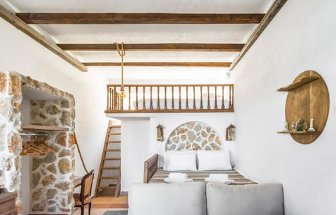 A spacious 30m2 traditional room with jacuzzi, decorated with stone and wood, wh  Spa Family Suite Room in boutique hotel vacation rental 43430116