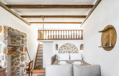 A spacious 30m2 traditional room with jacuzzi, decorated with stone and wood, wh  Spa Family Suite Room in boutique hotel vacation rental 43430116