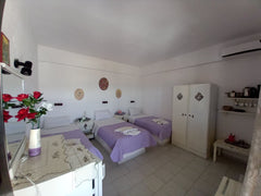 Comfortable and affordable holidays in at the seaside village of Kalamaki.<br />  Psiloritis - Triple room near the beach Private room in rental unit vacation rental 22159914