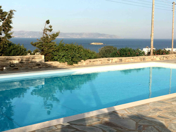 Stone house of 170 sqm with large communal pool and great sea views.<br />The re Athens, Greece KALLIRROE STONE VILLA 2 Cycladic home vacation rental 28045115