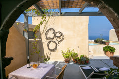 Luxury Italian-owned ground floor apartment in a classic Santorini cave house. T Pordenone, Italy Casa Itaca Fireplace Apartment Entire rental unit vacation rental 20227479