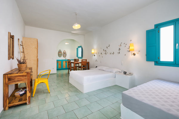 Studio :bedroom with a Queen size bed and a sitting area with a single bed, open Thira, Greece Modern Studio  with breakfast close to the beach Room in hotel vacation rental 1684520