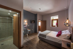 Double ground-floor suite is a 26 sq.m suite, hosted in the boutique hotel Blueb Chania, Greece Downtown Ground-floor suite Room in hotel vacation rental 32908461