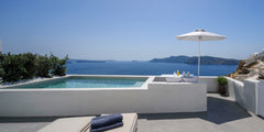 Endless blue just for you!<br /><br />The stylish interiors of our Premium Suite Oia, Greece Echoes Suites | Premium Suite with Plunge Pool Room in boutique hotel vacation rental 30193211