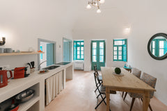 A conscious attempt to successfully maintain as much of the traditional architec  Santorinio Yellow House - Sea View 2 Bedrooms Cycladic home vacation rental 38023012