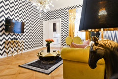 Relax on the yellow velvet sofa between the two horses, who form a beautiful lig Prague, Czechia Dalí Wenceslas Square Apartment Entire serviced apartment vacation rental 32867194
