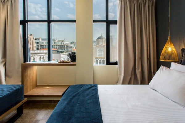 Our luxurious suites have a spacious and comfortable open-plan bedroom sitting a GR Senior Suite Metropolis View Room in aparthotel vacation rental 43493183