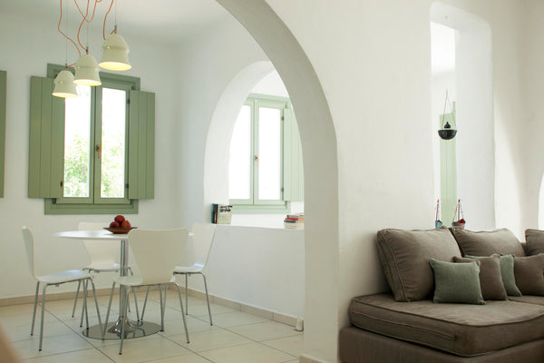 Minimal décor, branded furniture and lighting, traditional arches which act as d  Pylaias' House Entire serviced apartment vacation rental 32095909
