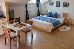 This studio comes with AC, terrace, welcoming kitchen/dining area, a bathroom/to Vienna, Austria Stunning Superhost Central Station Studio with AC Entire rental unit vacation rental 35816192