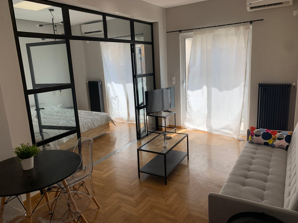 Live the deep Neapoli feeling, the district of revolution and the wild youth. Ou Palaio Faliro, Greece Cozy 1-bedroom Condo free cinema from balcony Entire condo vacation rental 638913200465344874