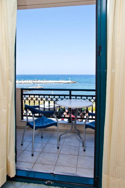 Marelina Villas is a beachfront hotel with a swimming pool in a very friendly at Rethimnon, Greece Marelina VIllas - Apartment 2 Bedrooms Sea View Room in hotel vacation rental 51160957