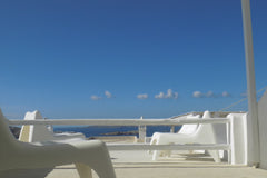 The house is located on the hill above Mykonos city  and old port.. so you can r  Overlooking Old Port Dammuso vacation rental 35049075